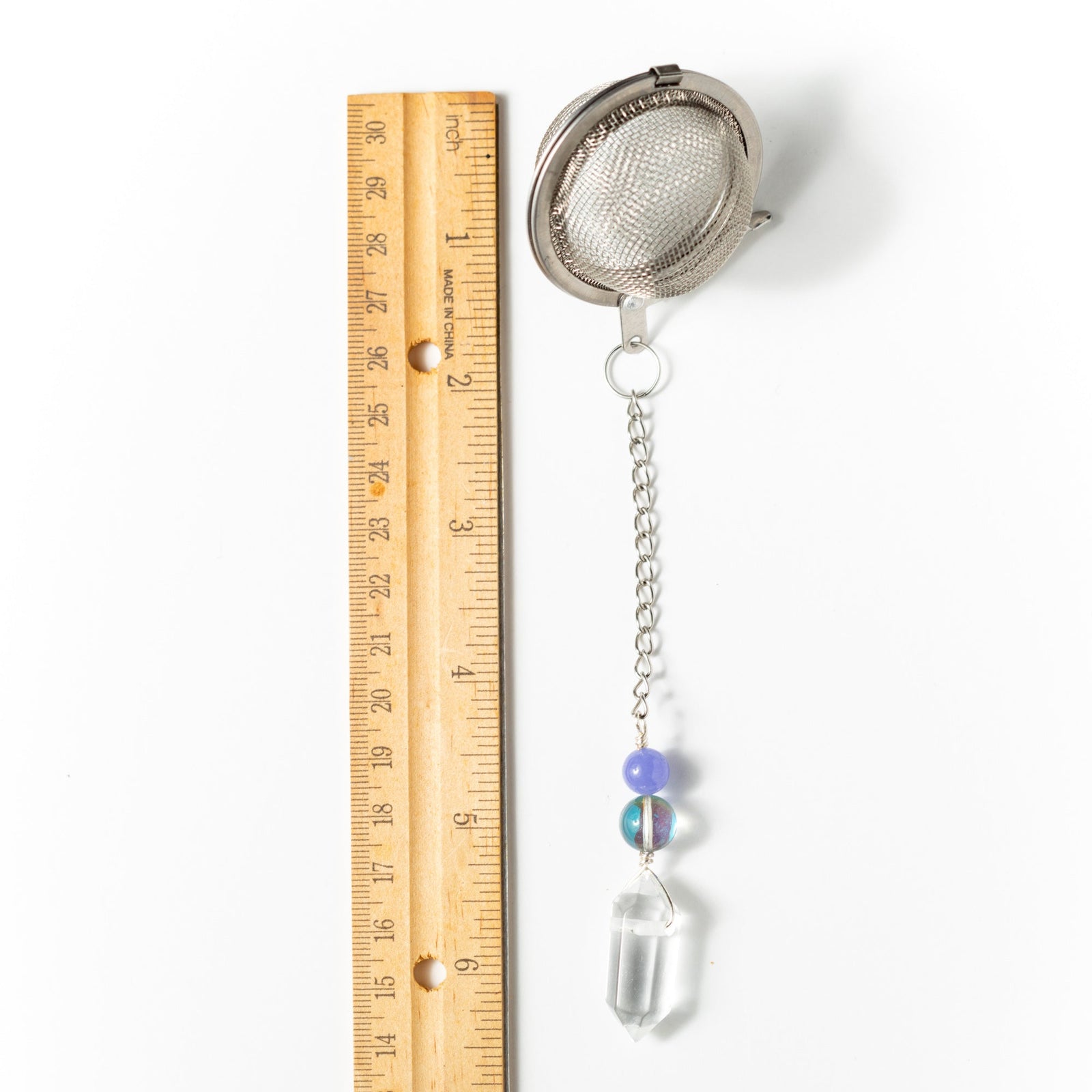 Crystal Energy Charmed Tea Infuser – Clear Quartz Point with Rainbow Spectrolite Bead by Kinley Jewelry