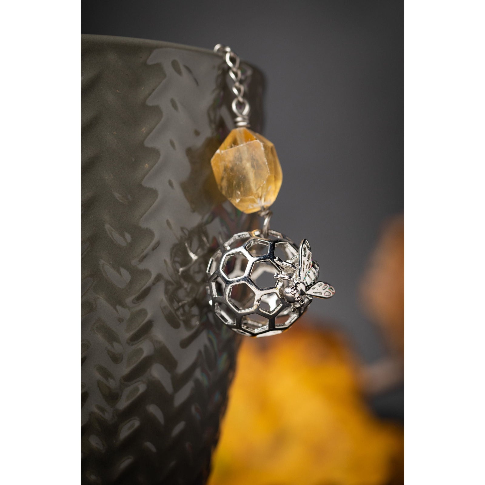 Honey Bee Charmed Tea Infuser with Honey Calcite Stone – Silver Honeycomb and Bee Charm with Honey Calcite by Kinley Jewelry
