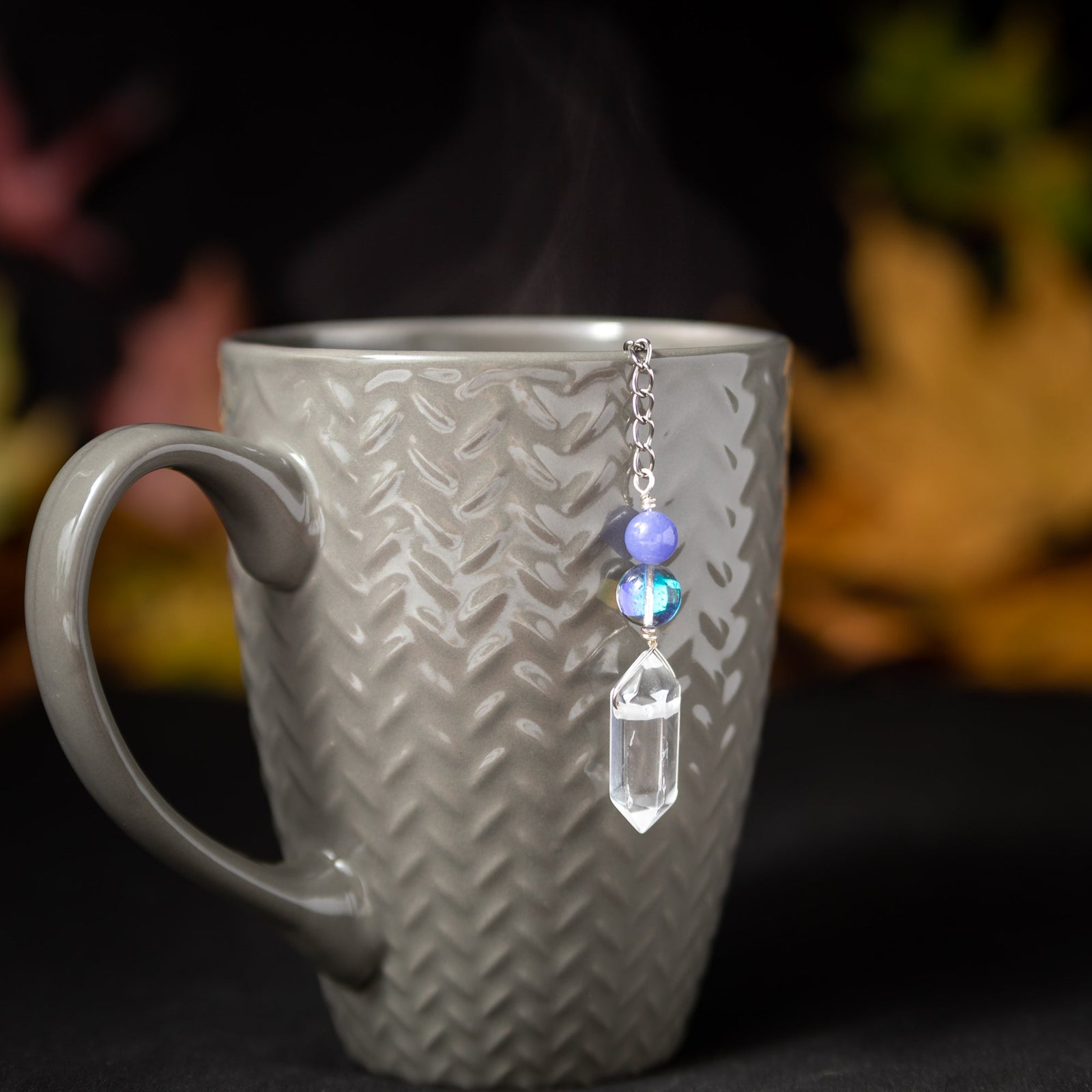 Crystal Energy Charmed Tea Infuser – Clear Quartz Point with Rainbow Spectrolite Bead by Kinley Jewelry