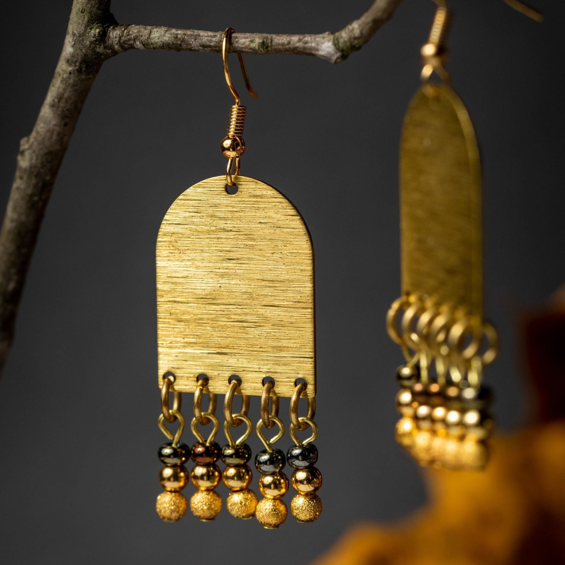 Shimmering Gold Arches with Bead Fringe