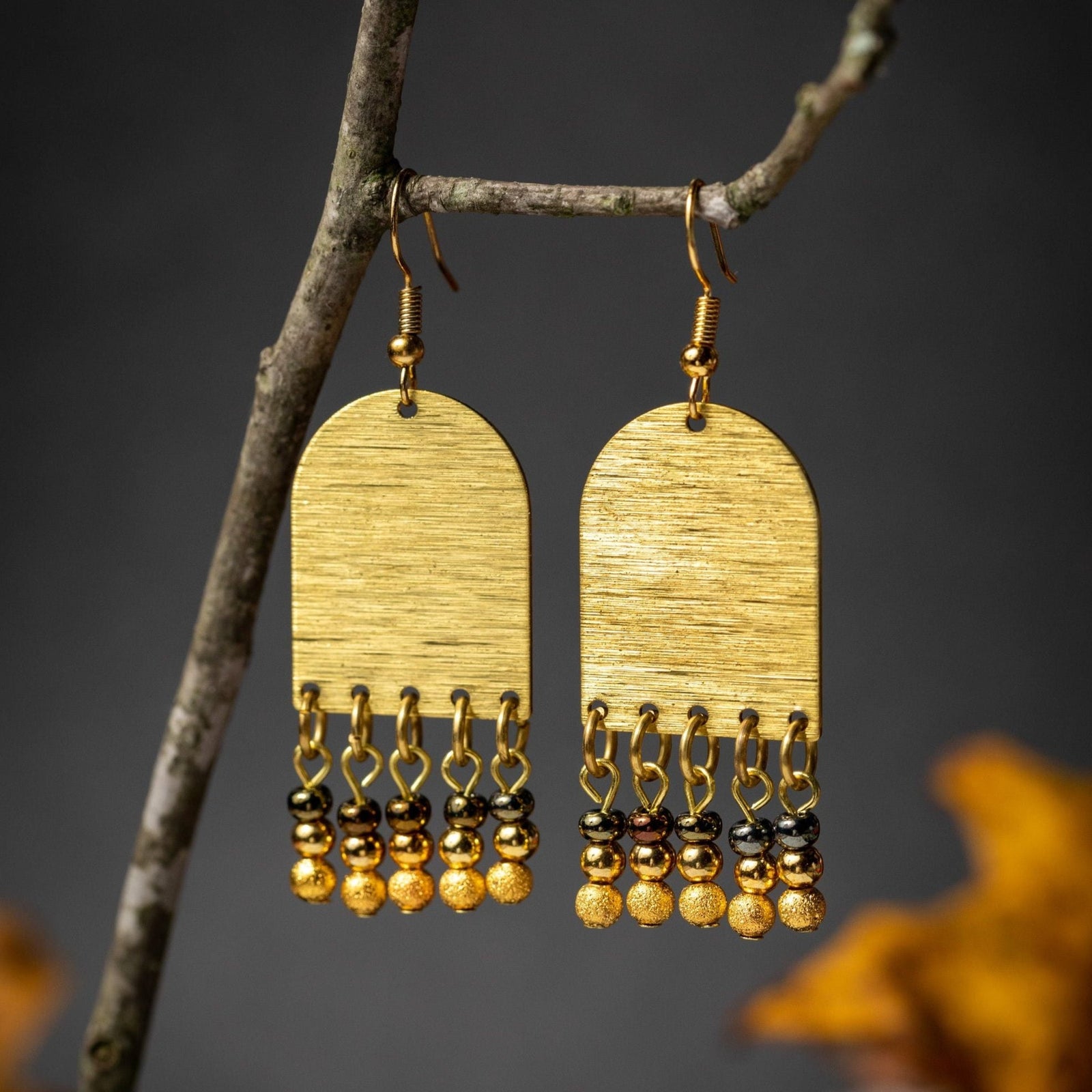 Shimmering Gold Arches with Bead Fringe