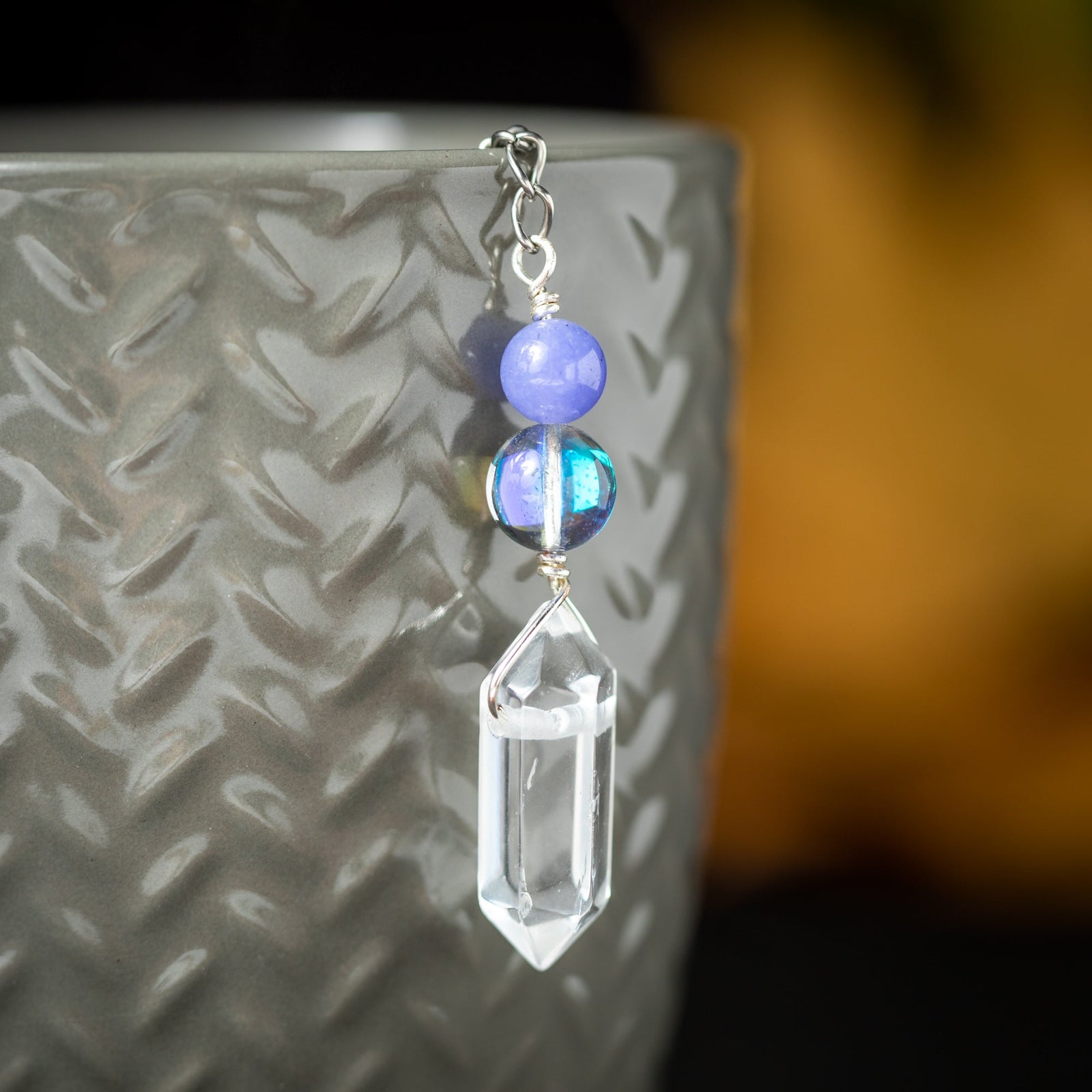 Crystal Energy Charmed Tea Infuser – Clear Quartz Point with Rainbow Spectrolite Bead by Kinley Jewelry