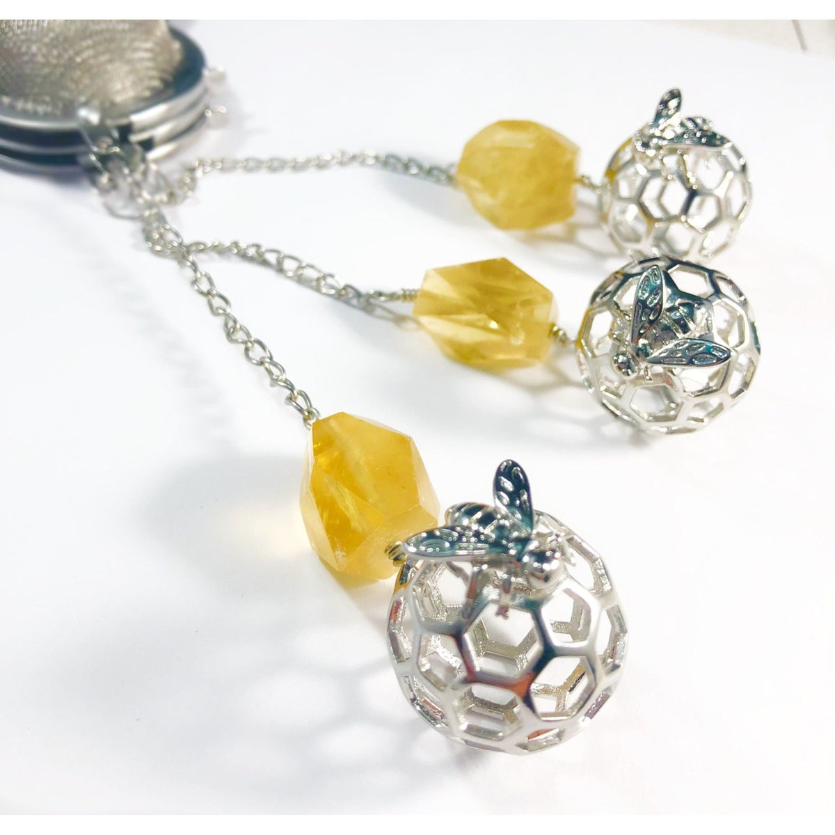 Honey Bee Charmed Tea Infuser with Honey Calcite Stone – Silver Honeycomb and Bee Charm with Honey Calcite by Kinley Jewelry