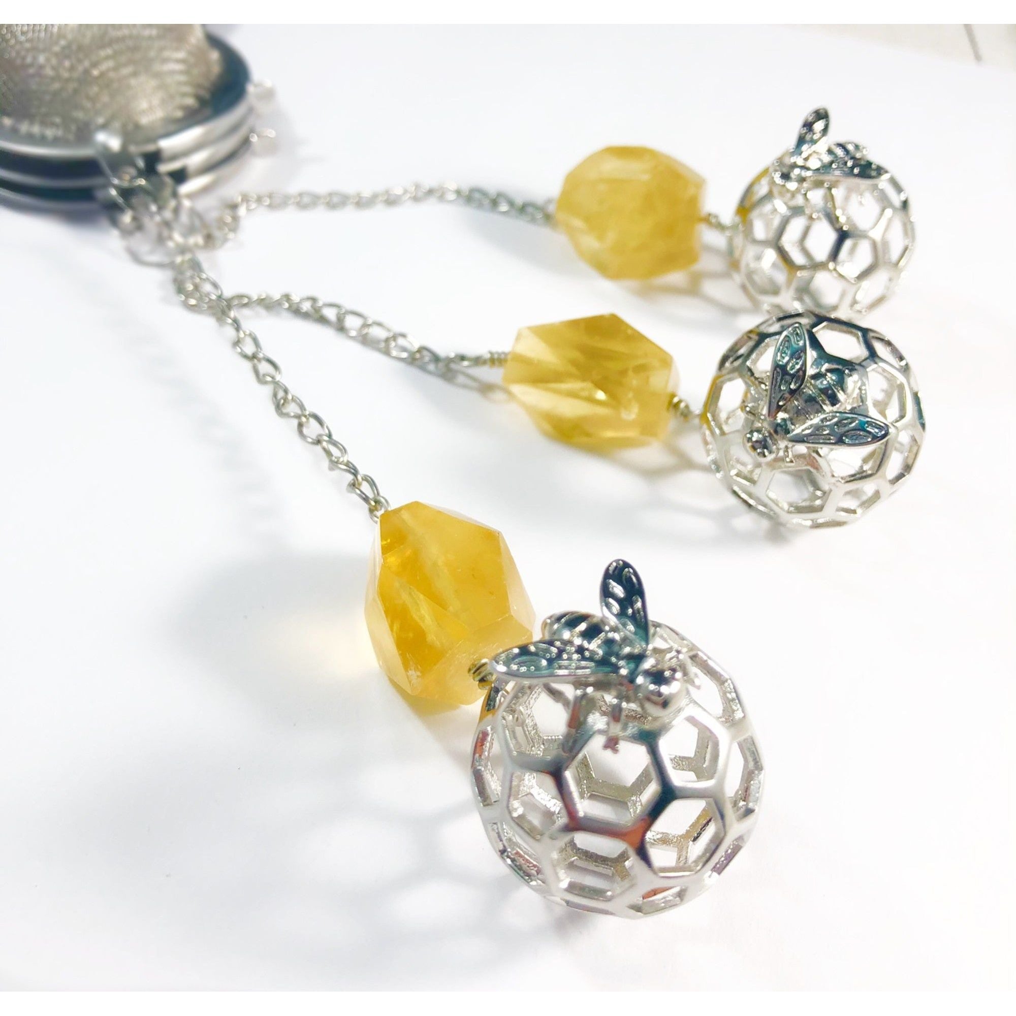 Honey Bee Charmed Tea Infuser with Honey Calcite Stone – Silver Honeycomb and Bee Charm with Honey Calcite by Kinley Jewelry